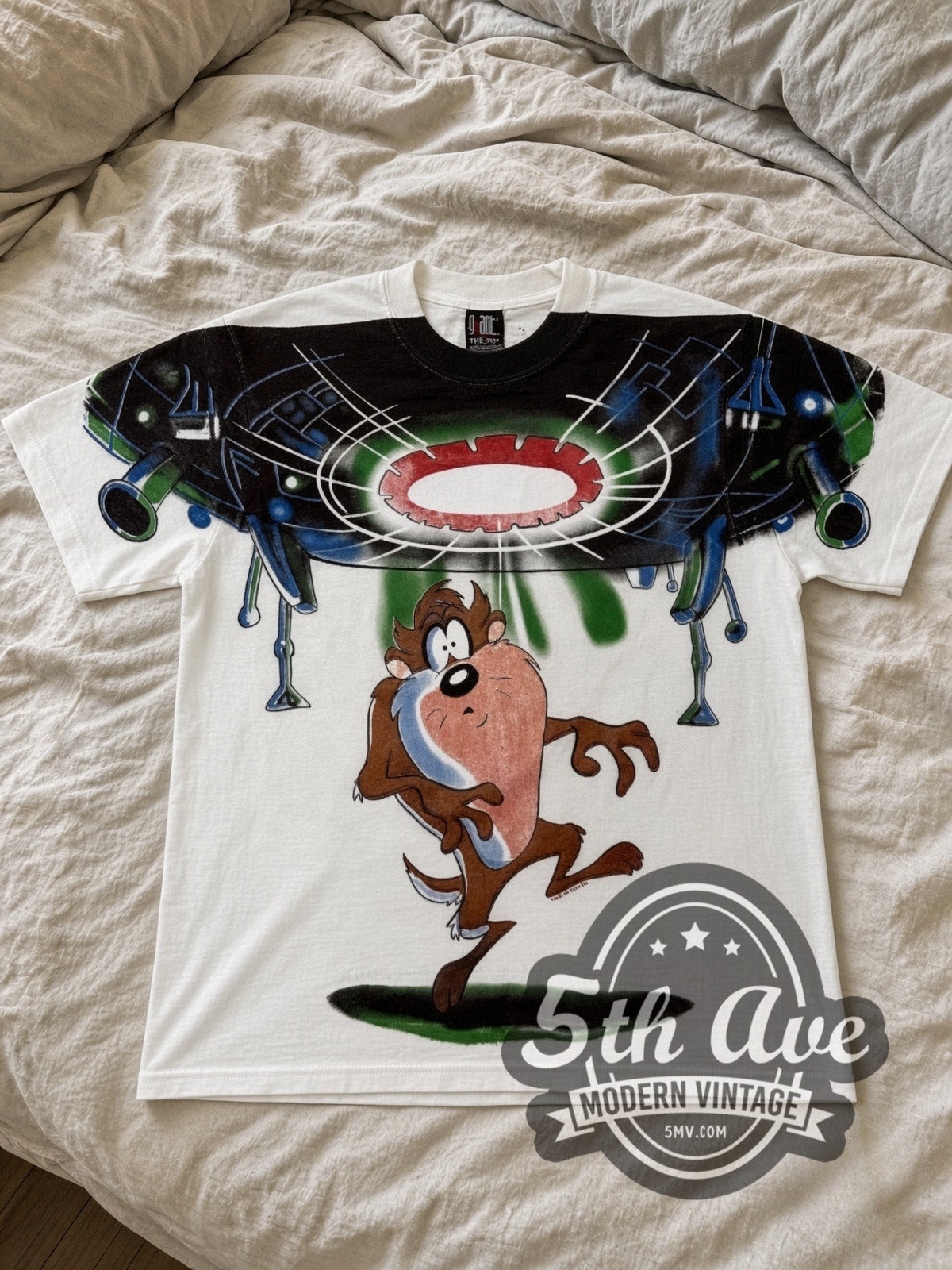 Looney Tunes Taz UFO Abduction all-over-print vintage cartoon tee in white laid flat