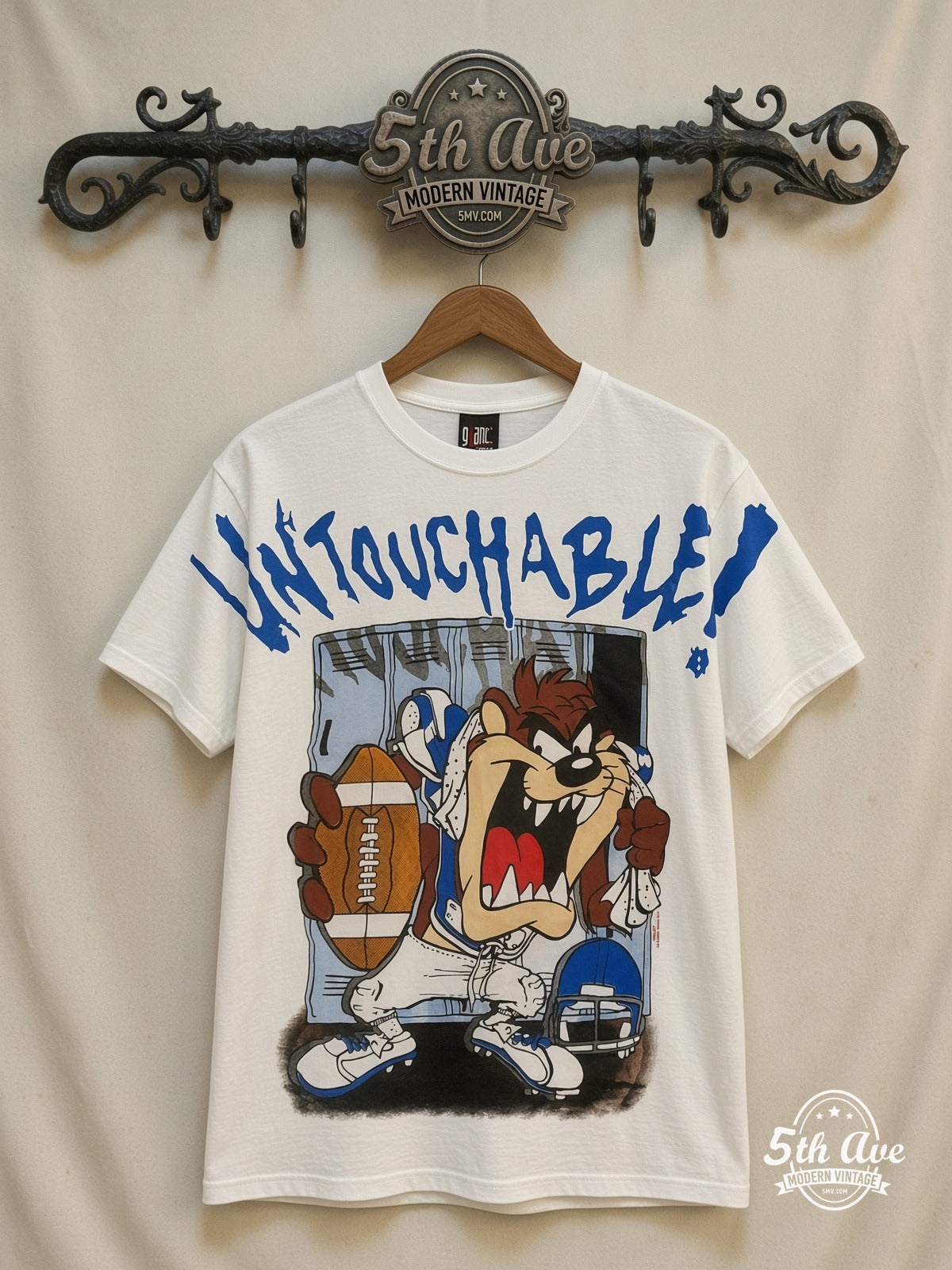 Looney Tunes Taz Untouchable Football all over print vintage cartoon t-shirt front on cream 5th Ave rack