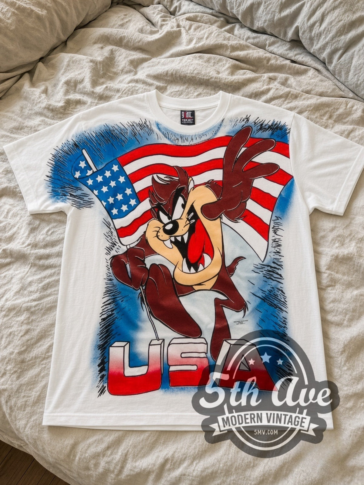 Looney Tunes Taz USA Flag all-over-print vintage cartoon tee in white laid flat