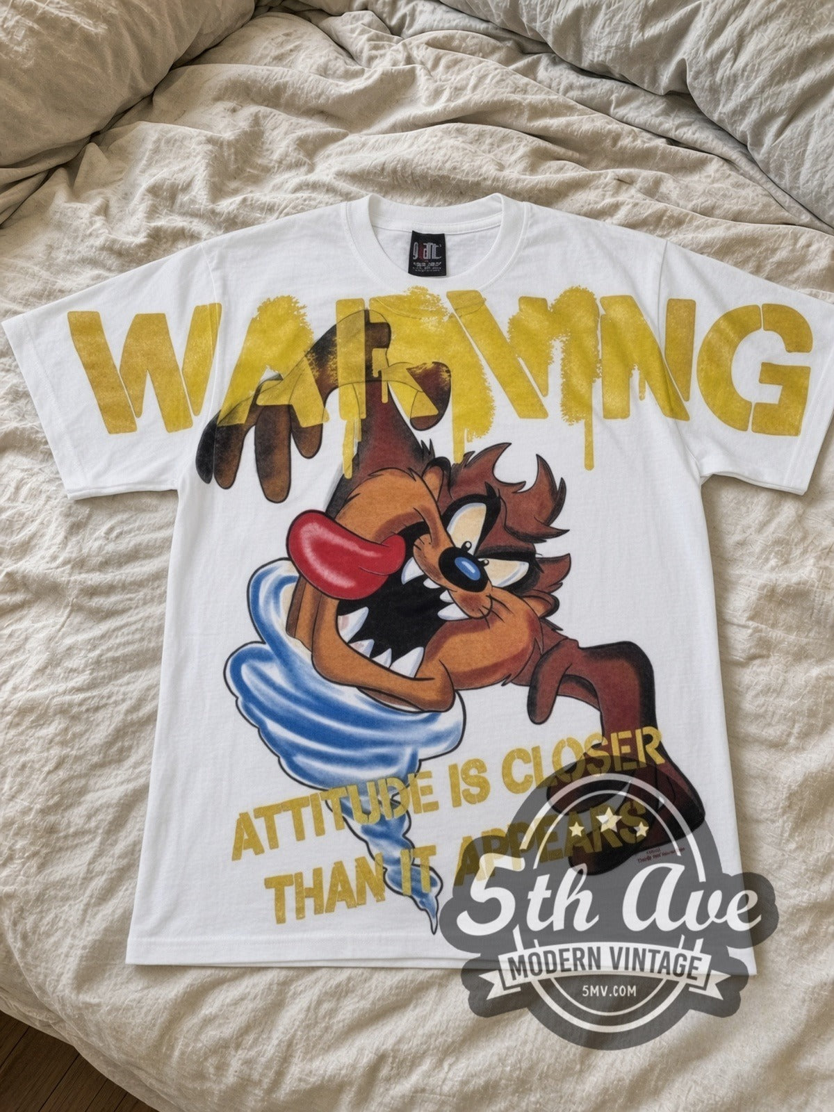 Looney Tunes Taz Warning Attitude Is Closer all-over-print vintage cartoon tee in white laid flat