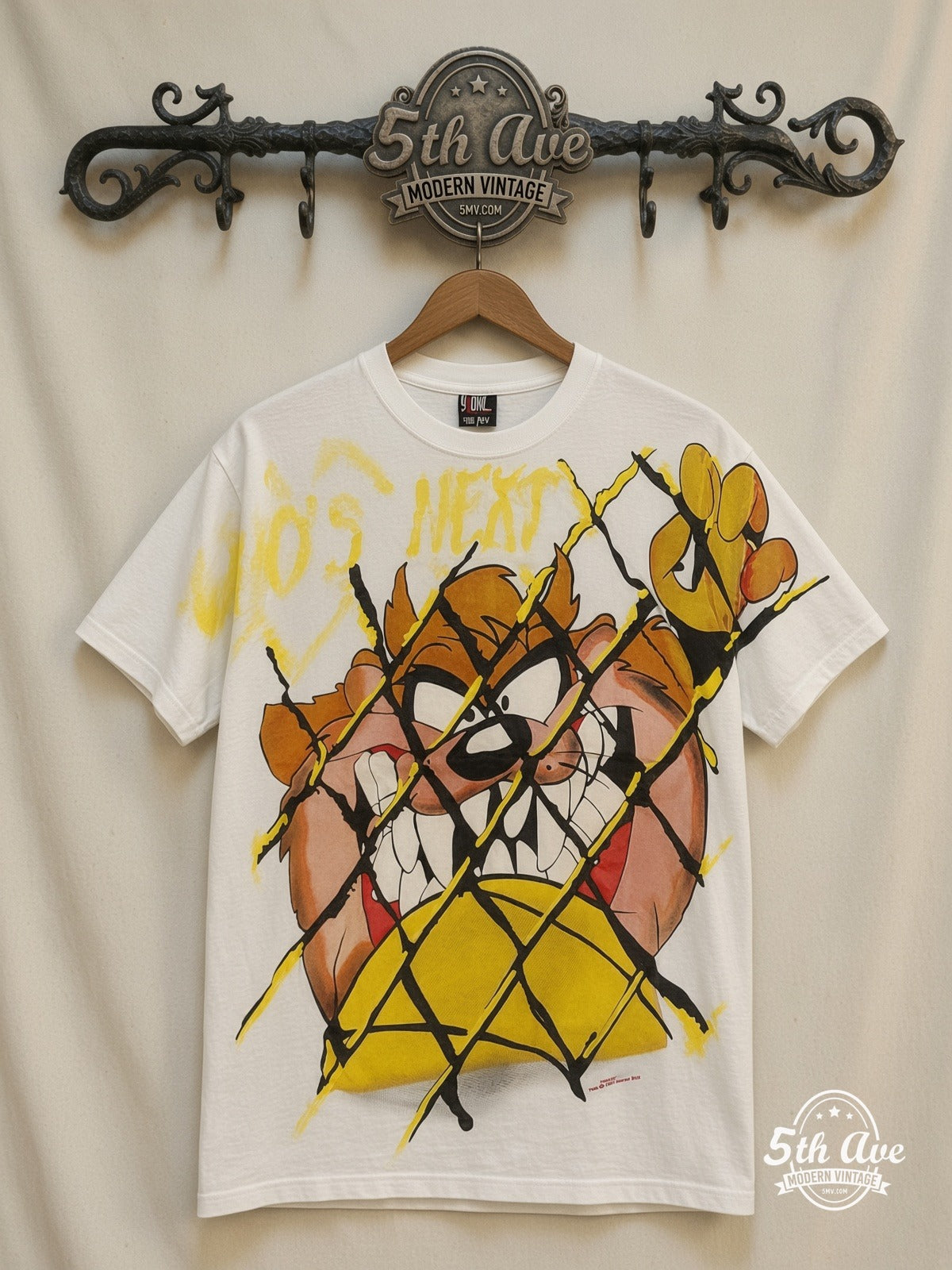 Looney Tunes Taz Who's Next all over print vintage cartoon t-shirt front on cream 5th Ave rack