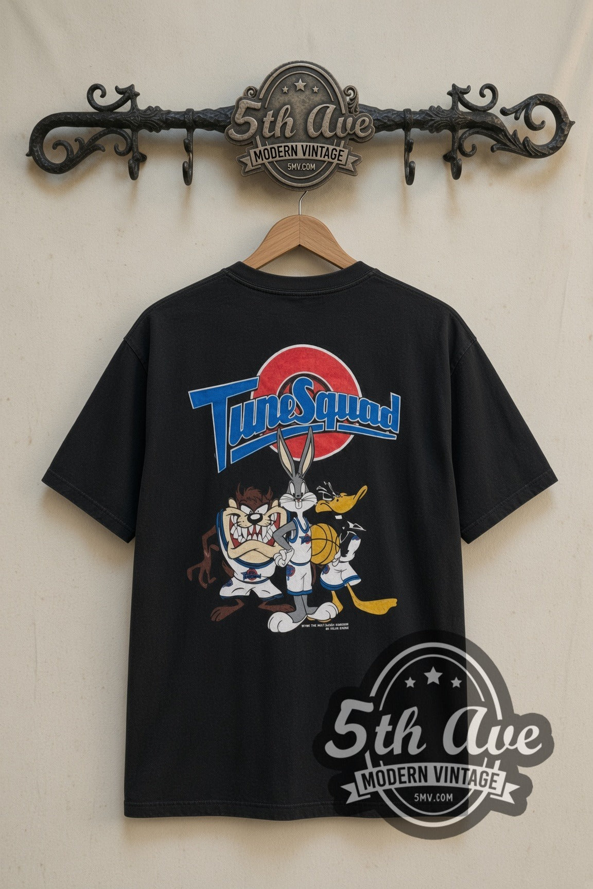 Looney Tunes Tune Squad Group cartoon tee in black, back view on a display rack