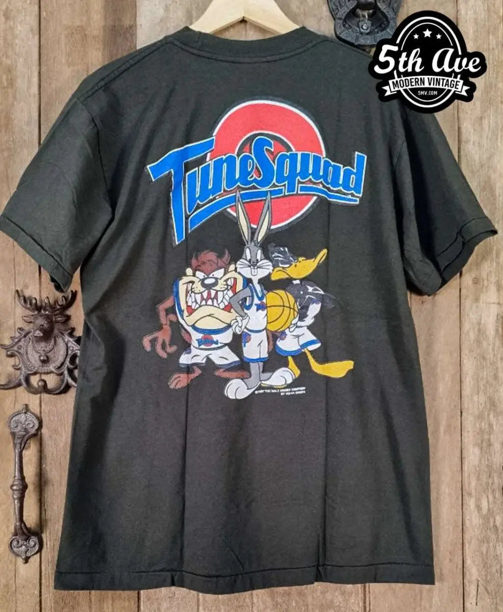 Looney Tunes – TuneSquad – New Vintage Graphic Tee vintage t-shirt laid on bed