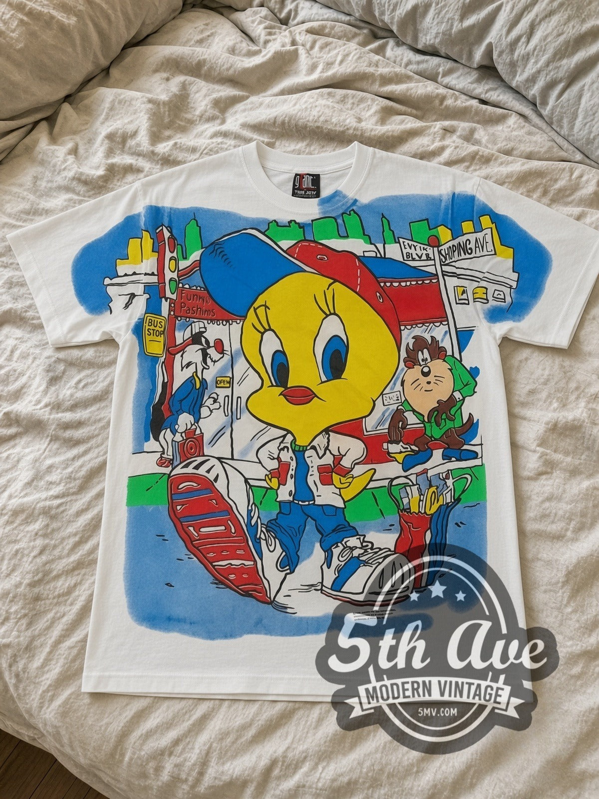 Looney Tunes Tweety Streetwear City all-over-print vintage cartoon tee in white laid flat