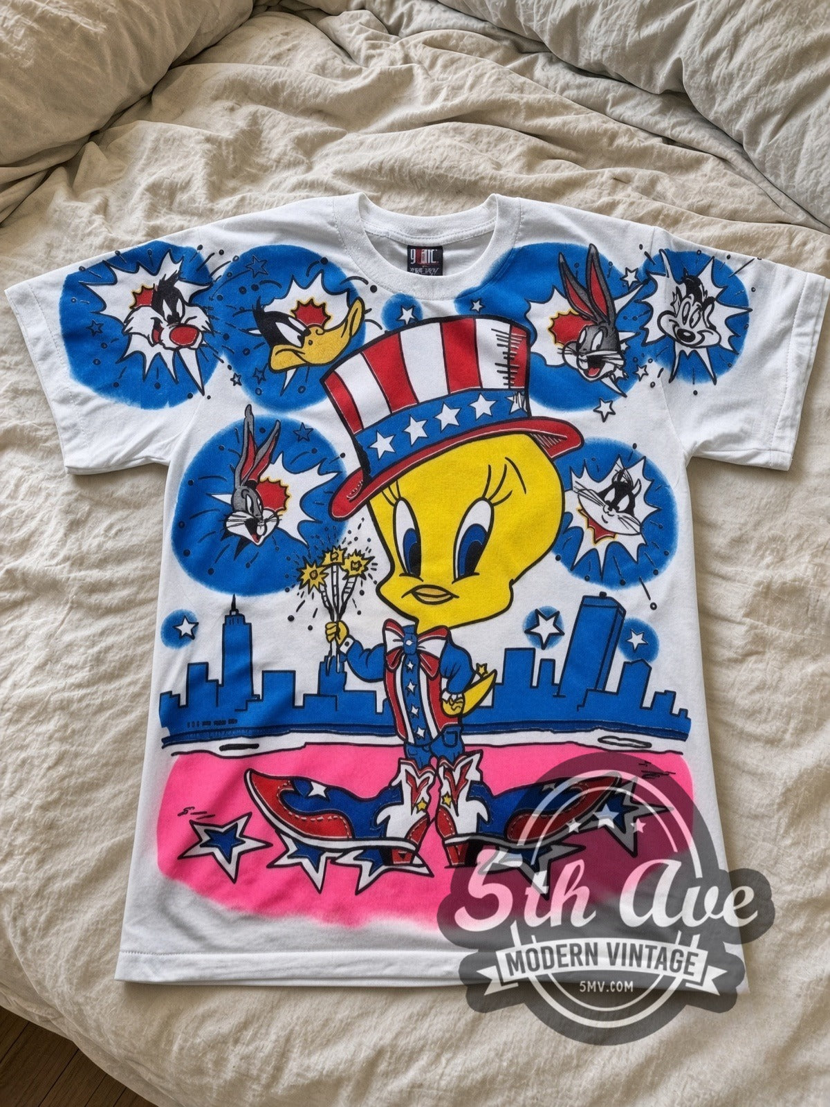 Looney Tunes Tweety Uncle Sam Patriotic all-over-print vintage cartoon tee in white laid flat