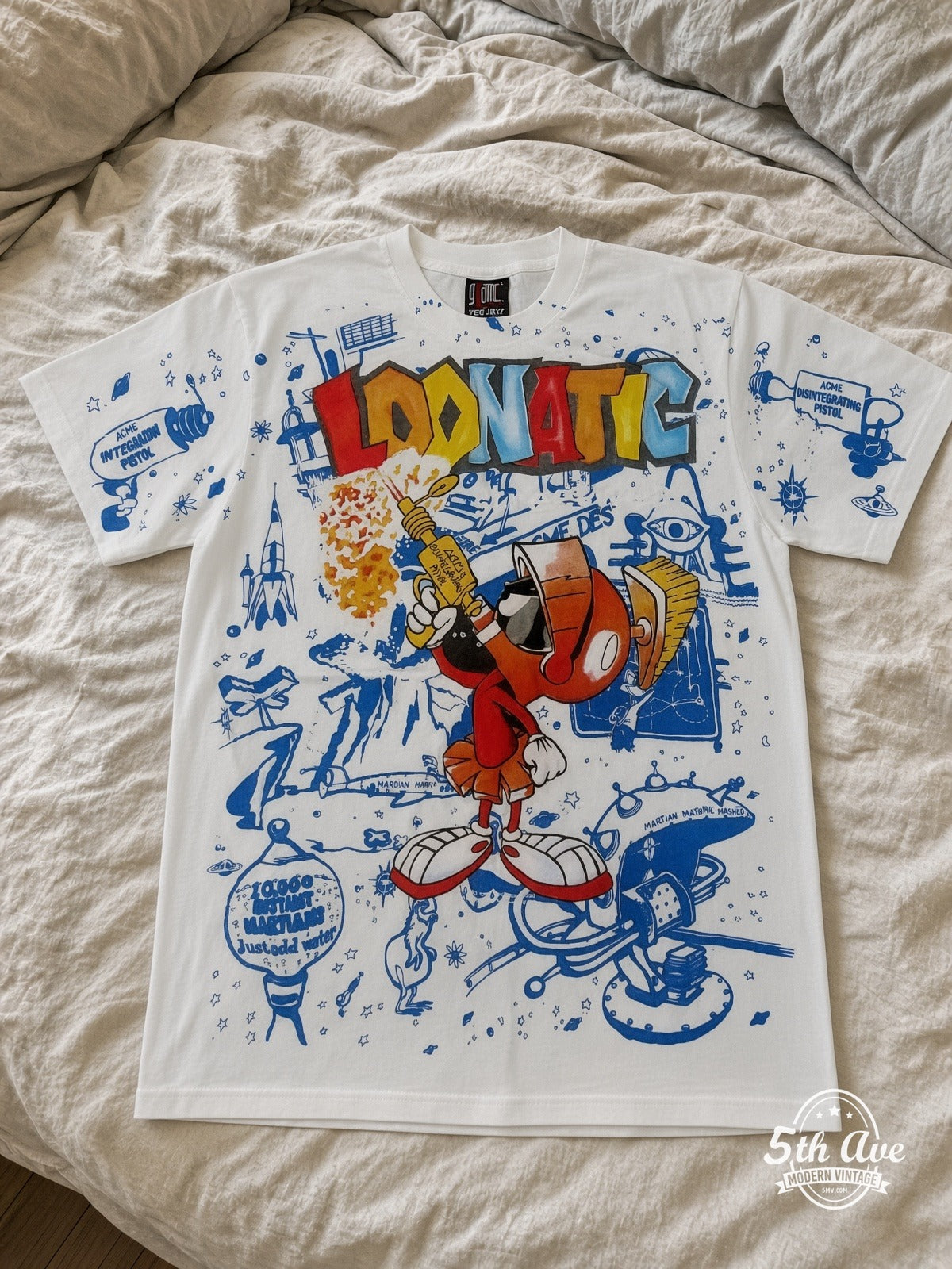 Looney Tunes Wile E Coyote Loonatic vintage tee laid on bed