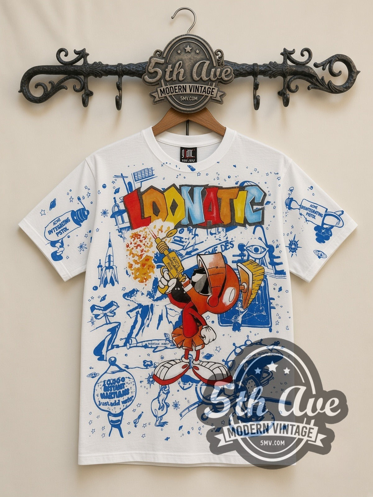 Looney Tunes Marvin the Martian Loonatic all-over-print vintage cartoon t-shirt, front view on a display rack