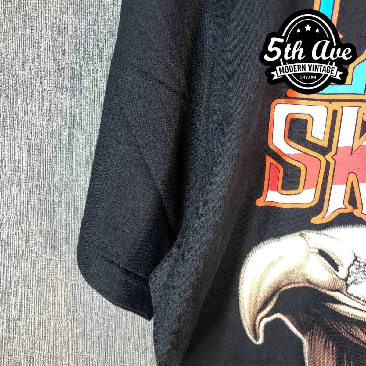 Model wearing Lynyrd Skynyrd vintage band tee