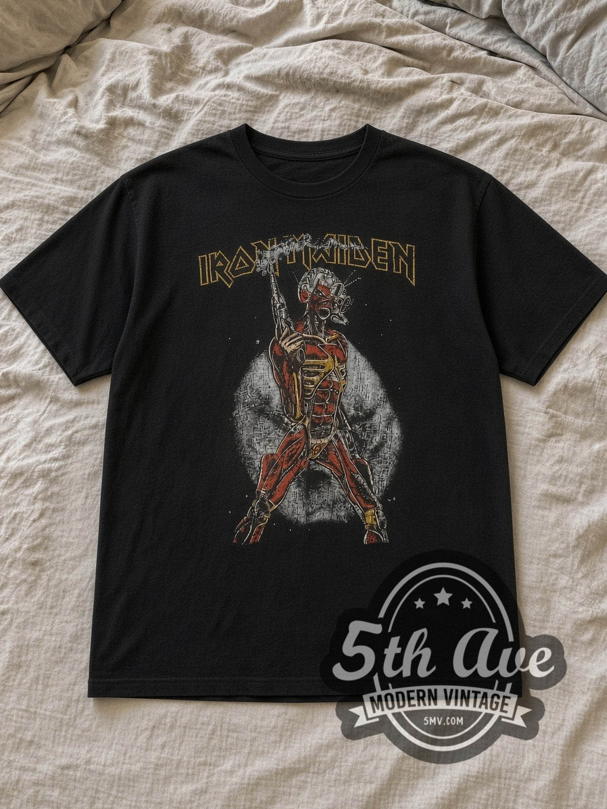 Black Iron Maiden Somewhere in Time Cyborg Eddie Vintage Band T-Shirt laid flat on a linen bed