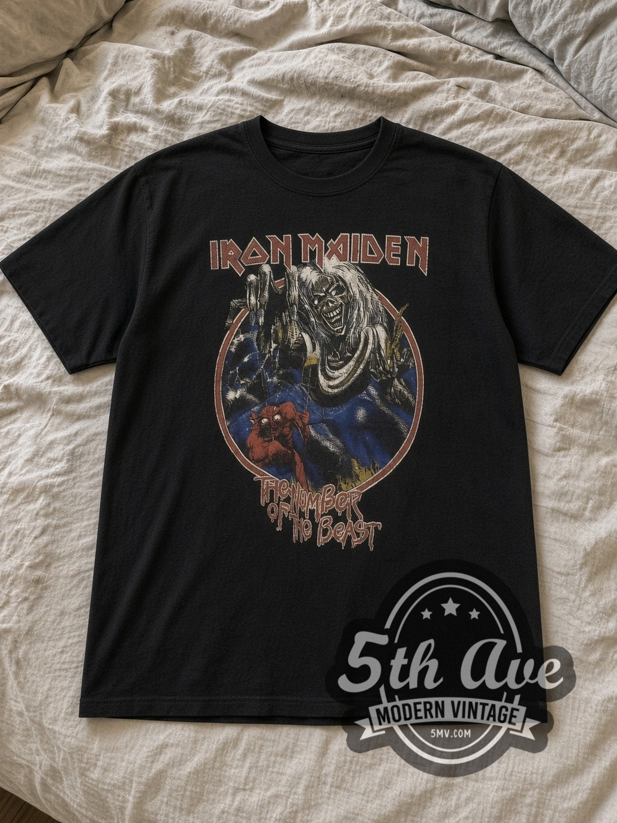 Charcoal Iron Maiden The Number of the Beast Vintage Band T-Shirt laid flat on a linen bed