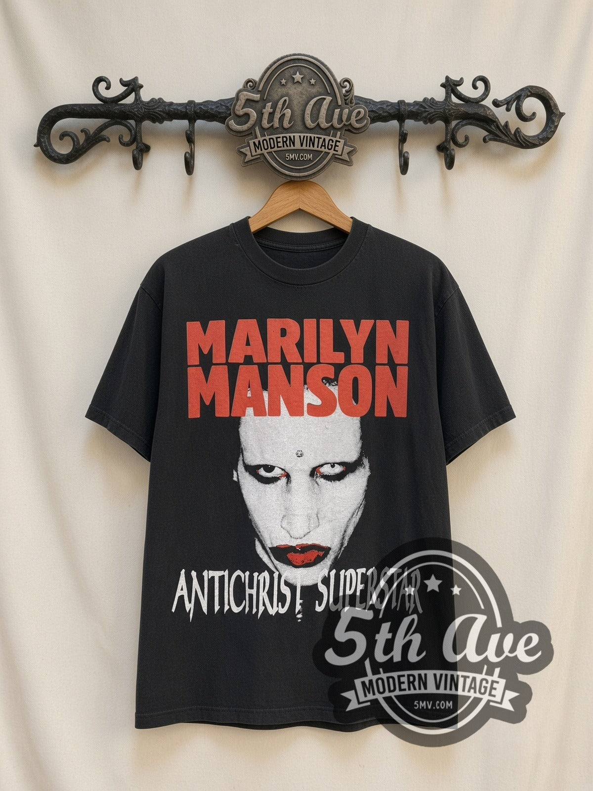 Marilyn Manson Antichrist Superstar Tour vintage band t-shirt, front view on a display rack