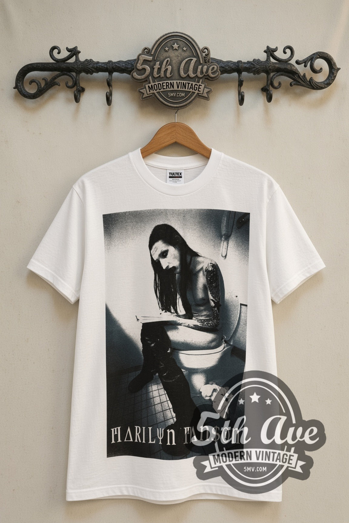 Marilyn Manson Bathroom Photo & Green Logo vintage band t-shirt front on 5th Ave iron rack