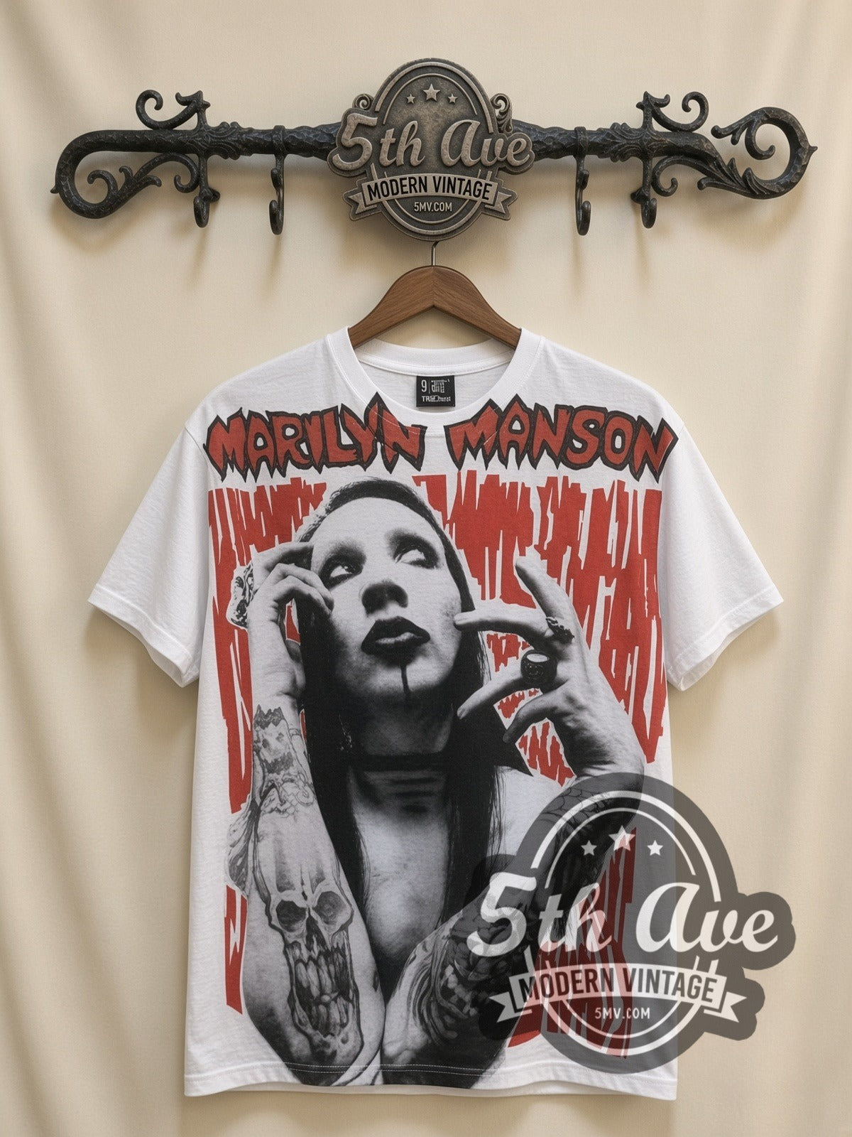 Marilyn Manson Face Closeup all-over-print vintage band t-shirt in white, front view on a display rack