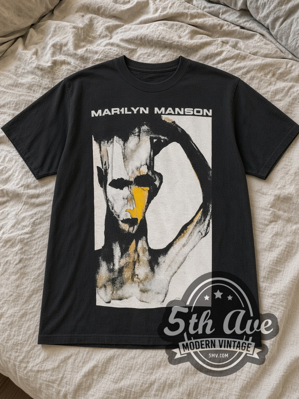 Black Marilyn Manson 'I Don't Like the Drugs' (But the Drugs Like Me) Vintage Band T-Shirt laid flat on a linen bed