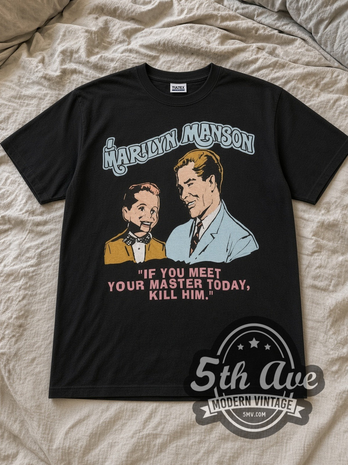 Black Marilyn Manson Meet Your Master Vintage Band T-Shirt laid flat on a linen bed