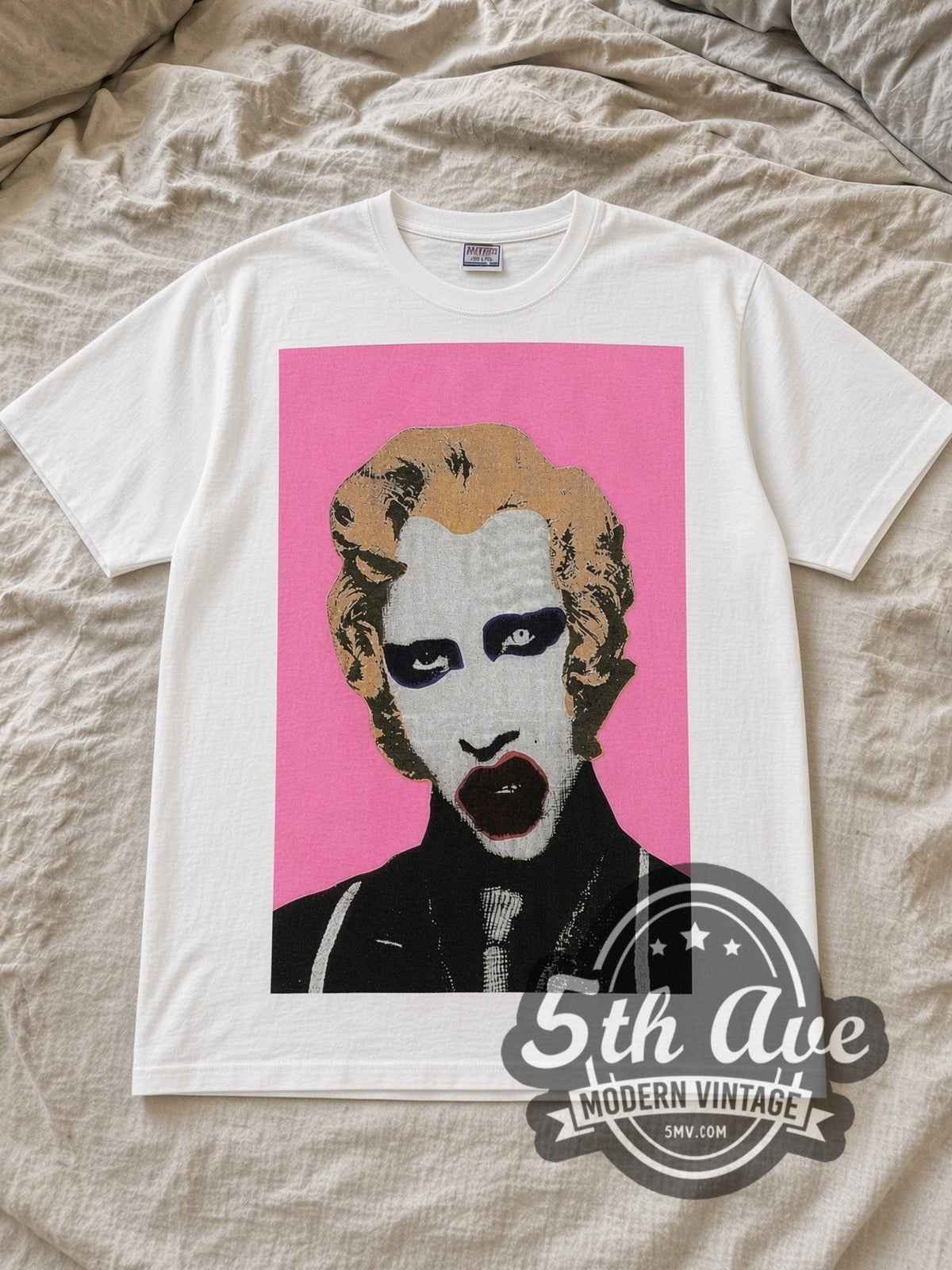 White Marilyn Manson Pop Art Vintage Band T-Shirt laid flat on a linen bed