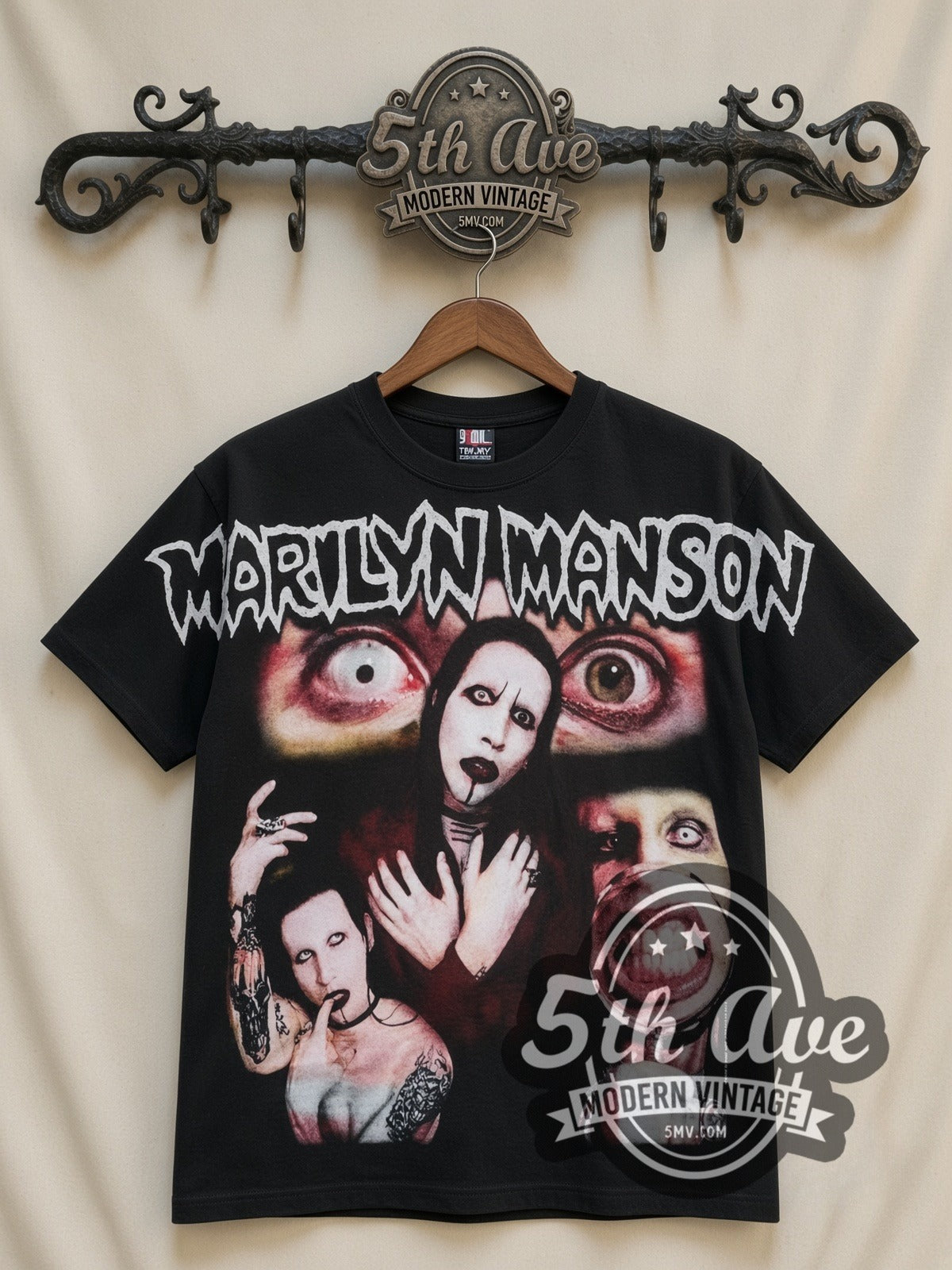 Marilyn Manson Thinker Performer all-over-print vintage band t-shirt in black, front view on a display rack