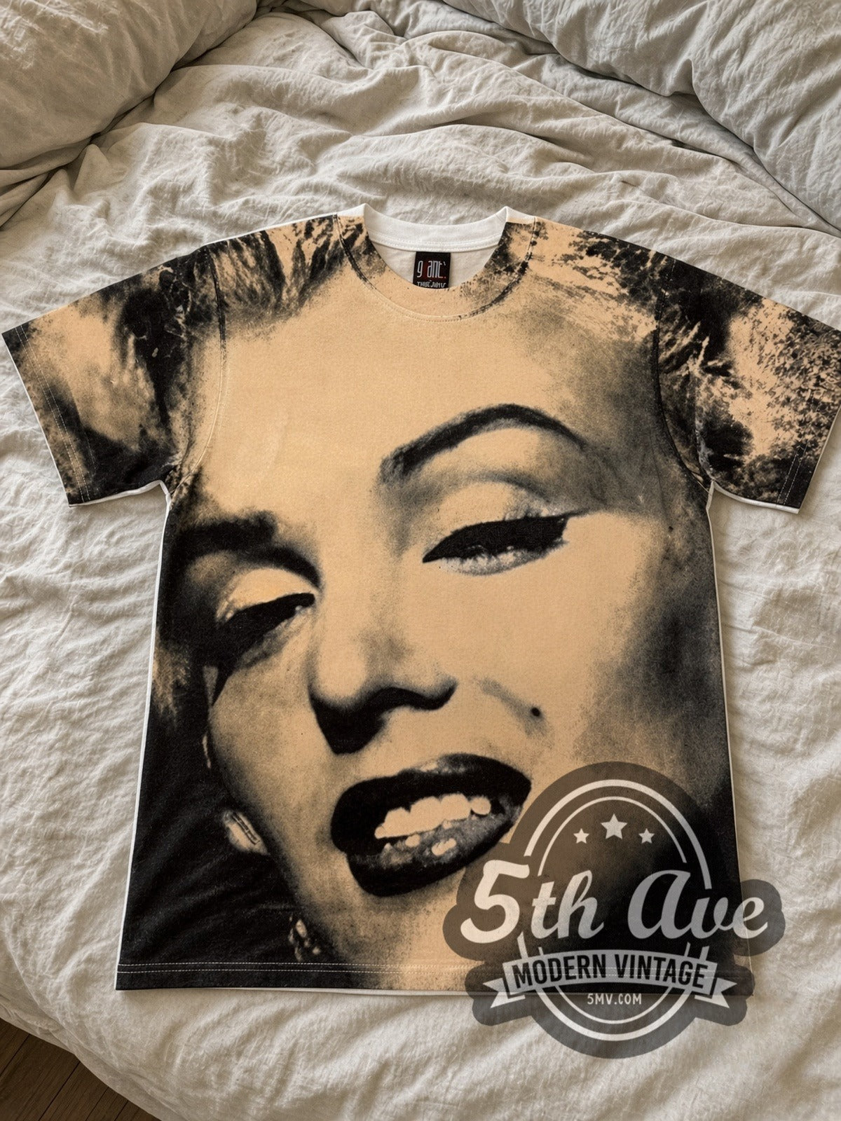 Marilyn Monroe Face Closeup Cream all-over-print vintage graphic tee laid flat