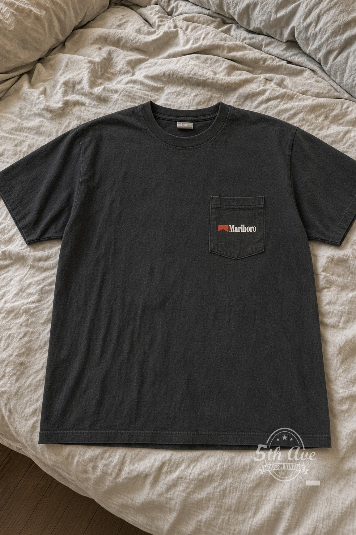 Marlboro Marlboro Man Cowboy Silhouette Pocket Tee vintage tee laid flat on bed