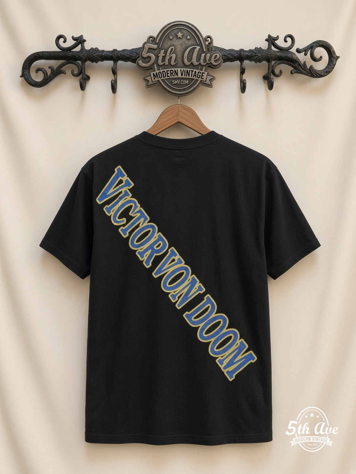Marvel Dr Doom Cosmic Battle vintage tee laid on bed
