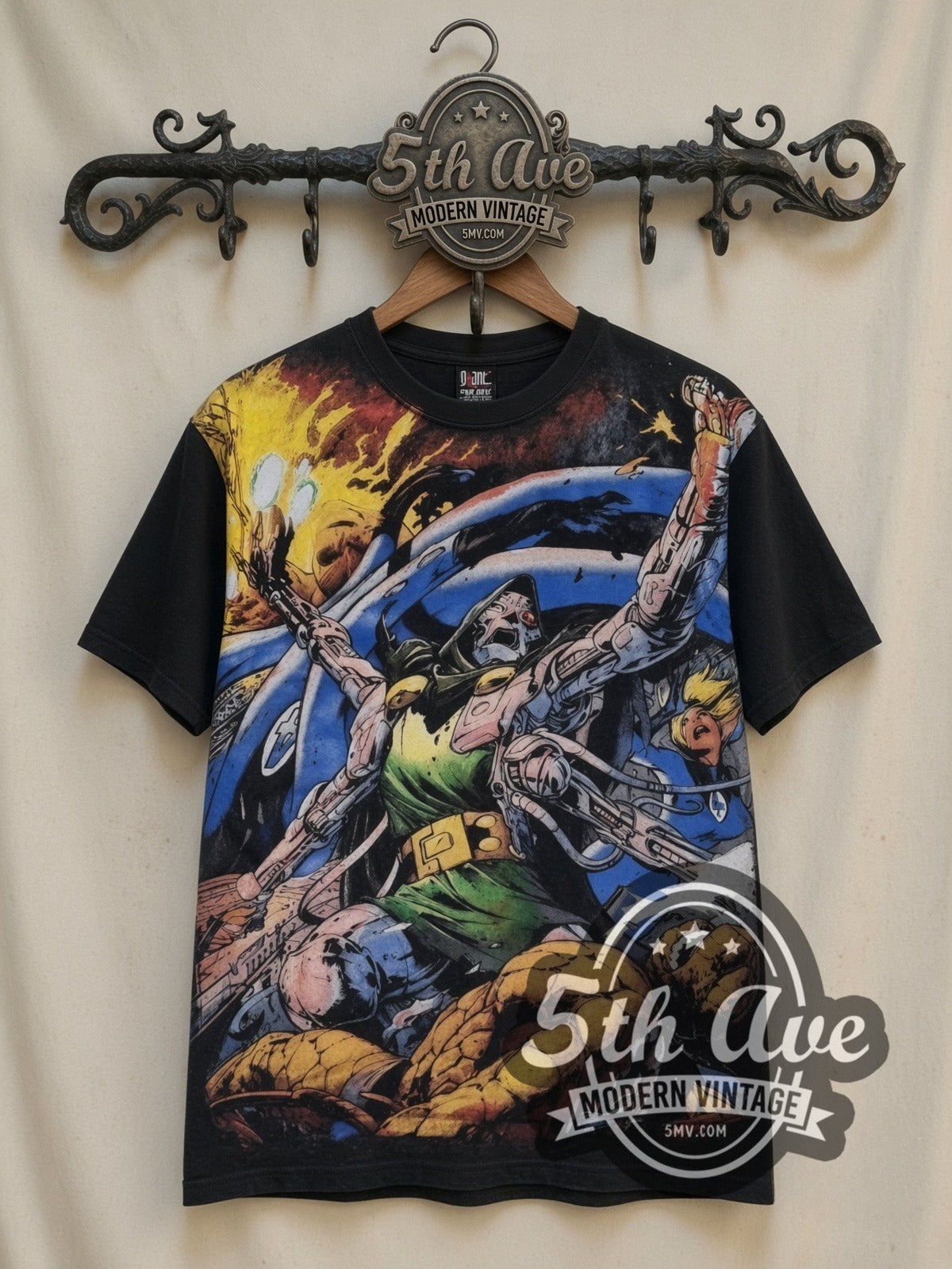 Marvel Dr. Doom Cosmic Battle all-over-print vintage cartoon t-shirt in black, front view on a display rack