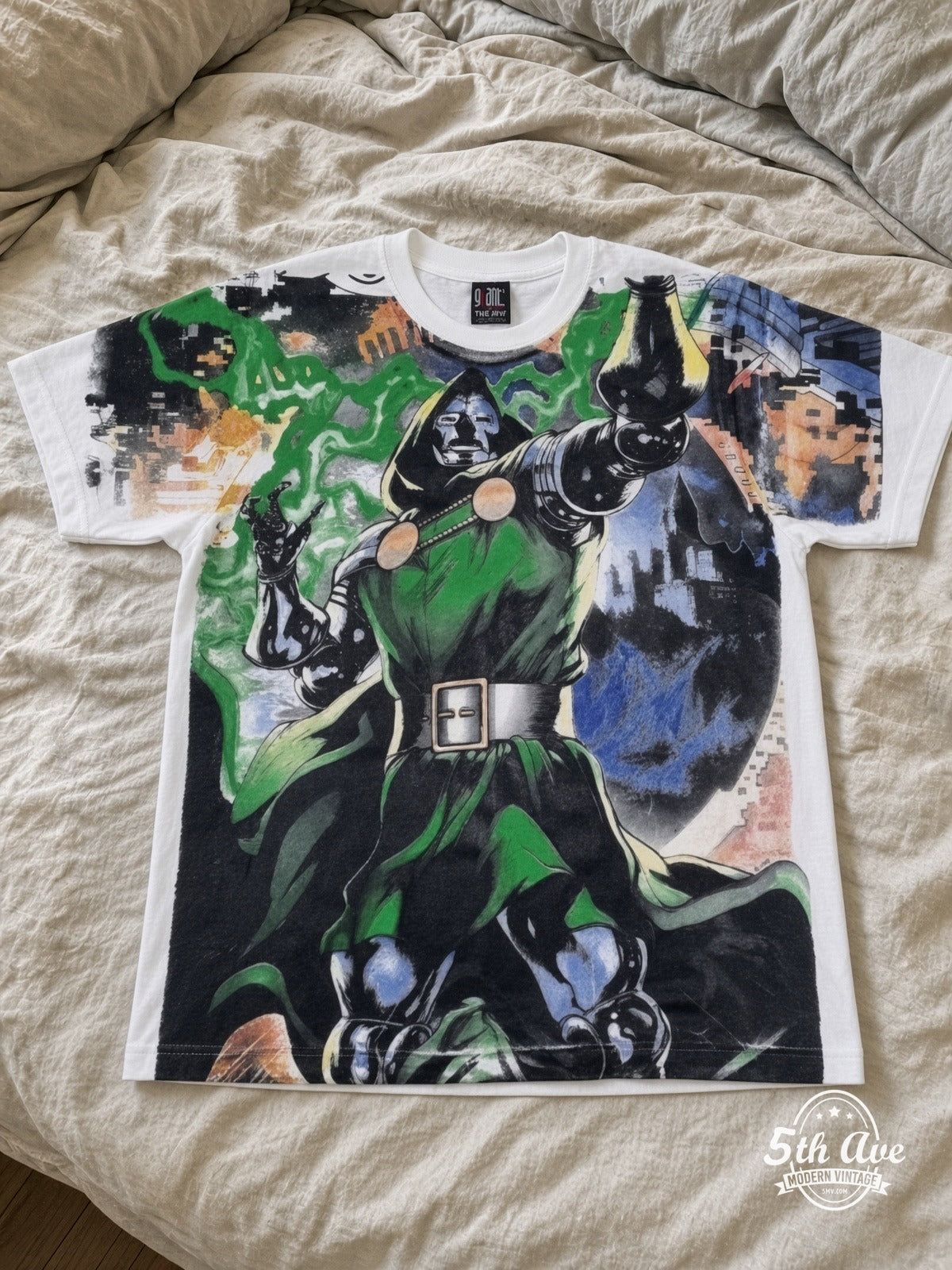 Marvel Dr Doom Standing Portrait vintage tee laid on bed