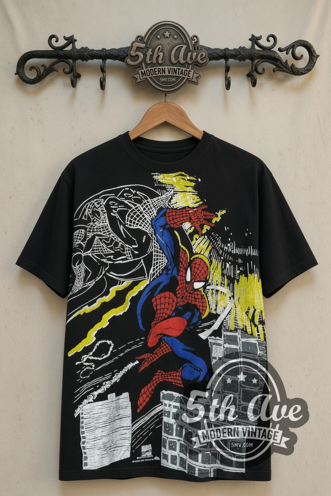 Marvel Spider-Man all-over-print vintage comic tee on the 5MV rack – front print with Spider-Man swinging over the city