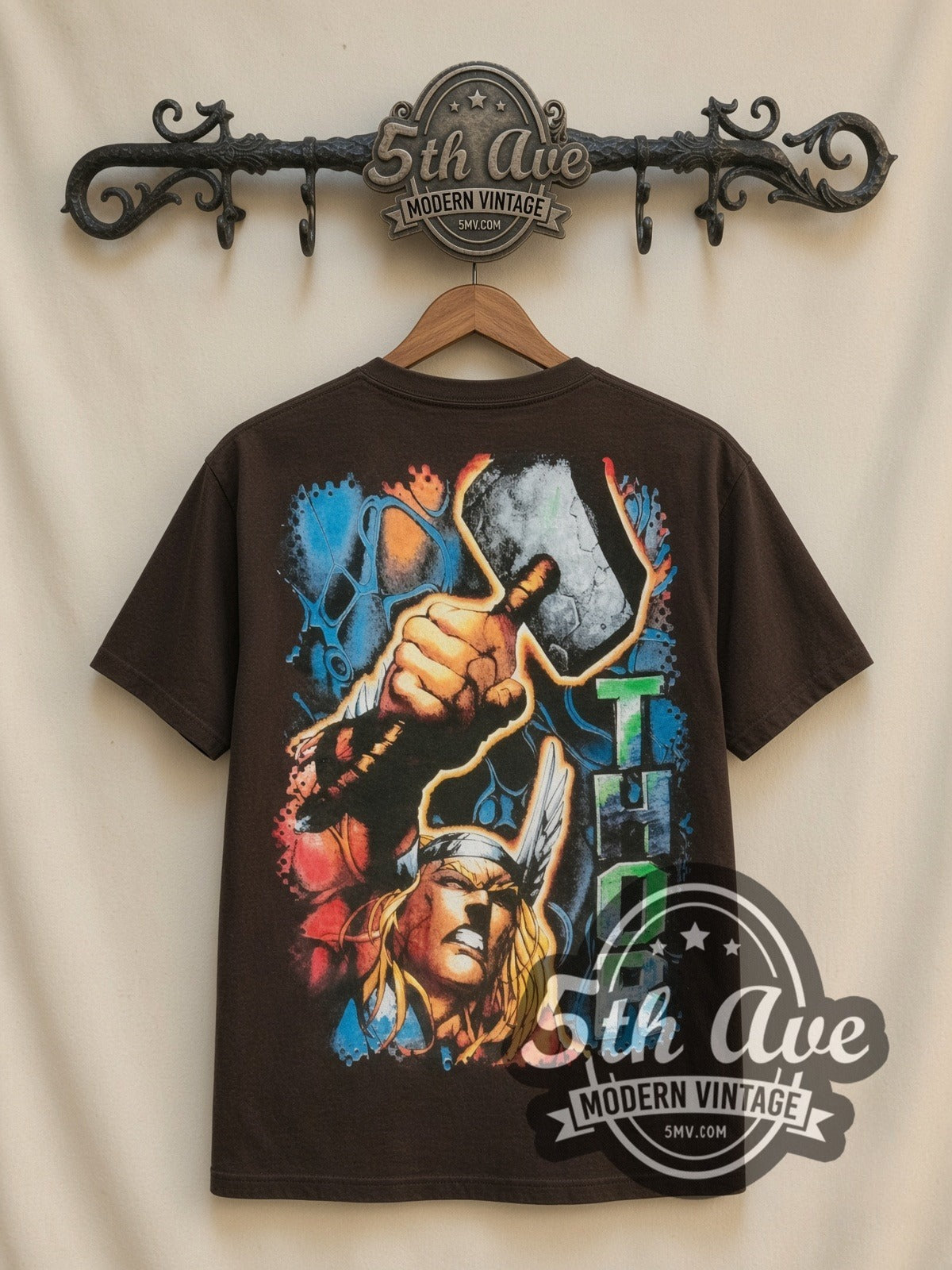 Marvel Thor Comic Action all-over-print vintage cartoon t-shirt in brown, back view on a display rack