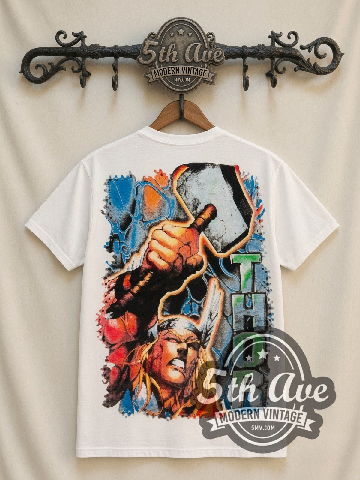 Marvel Thor Comic Action all-over-print vintage cartoon t-shirt in white, back view on a display rack