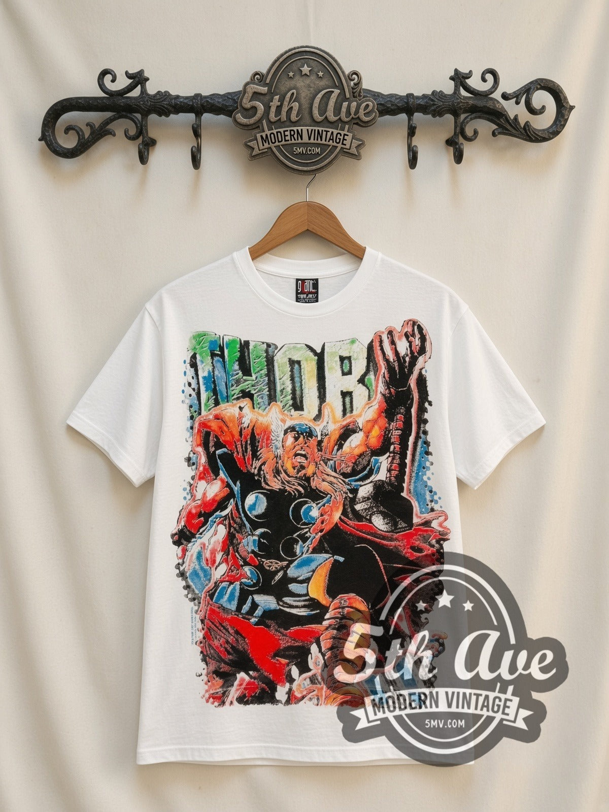 Marvel Thor Comic Action all-over-print vintage cartoon t-shirt in white, front view on a display rack