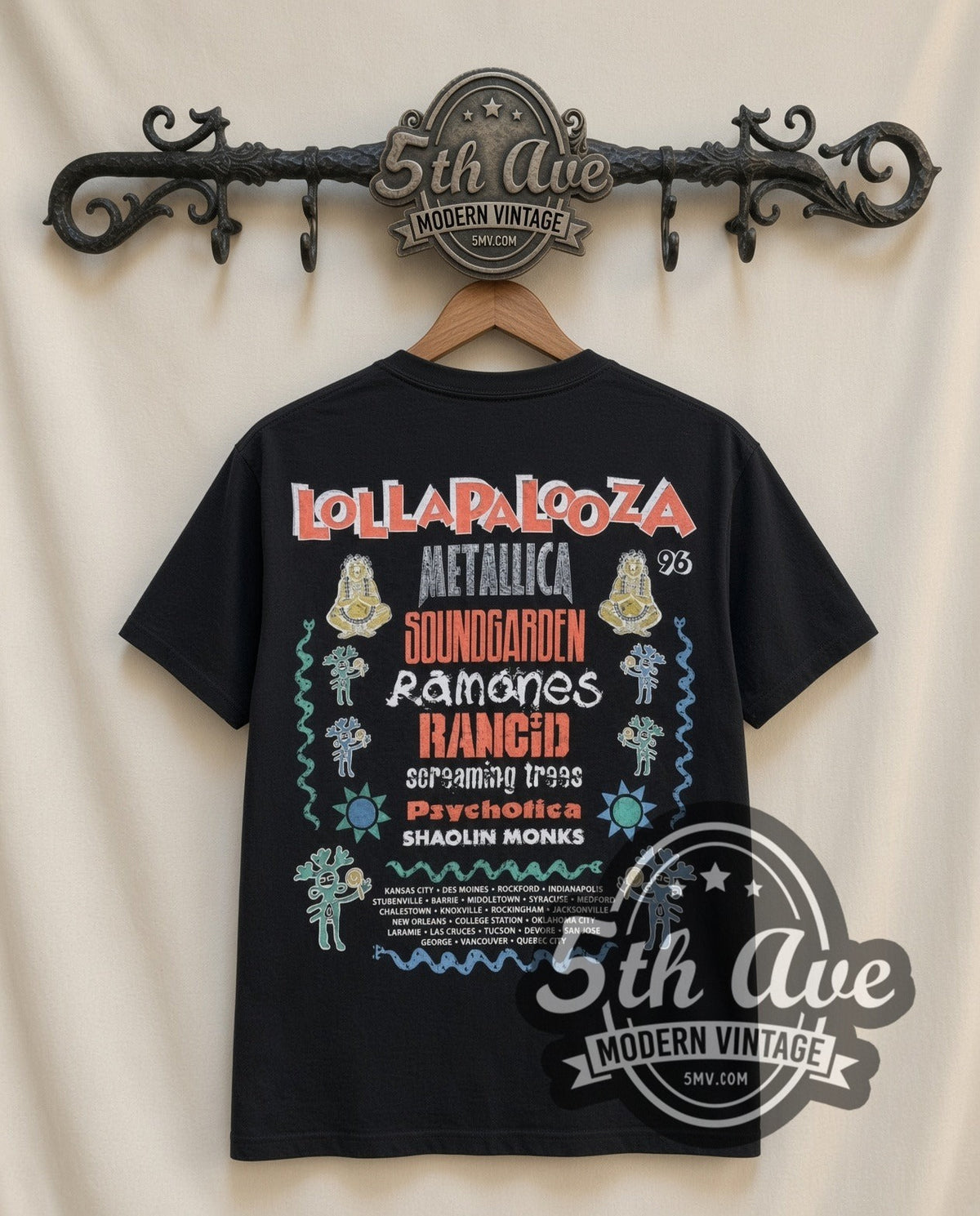 Metallica Load Lollapalooza 1996 vintage band t-shirt in black, back view on a display rack