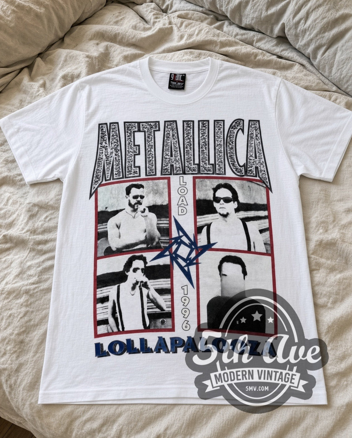 Metallica Load Lollapalooza 1996 vintage band t-shirt in white laid flat on a bed, front artwork