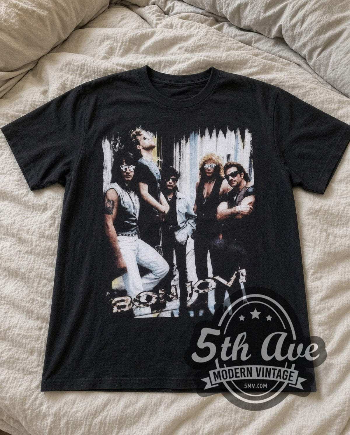 Bon Jovi Band Photo vintage band t-shirt in black laid flat on a bed, front artwork