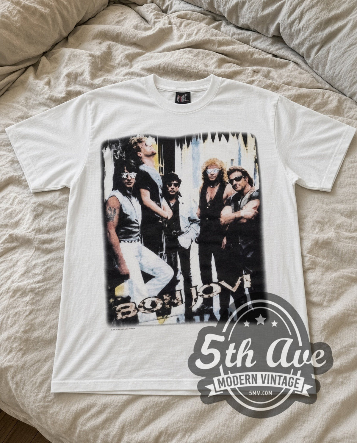 Bon Jovi Band Photo vintage band t-shirt in white laid flat on a bed, front artwork