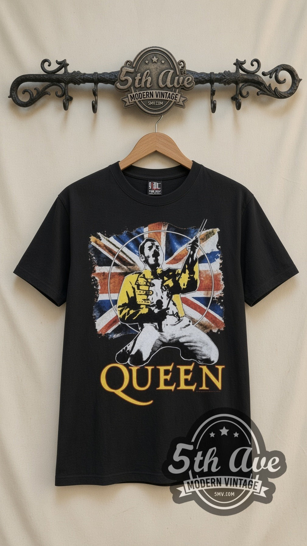 Queen Freddie Union Jack vintage band t-shirt in black, front view on a display rack