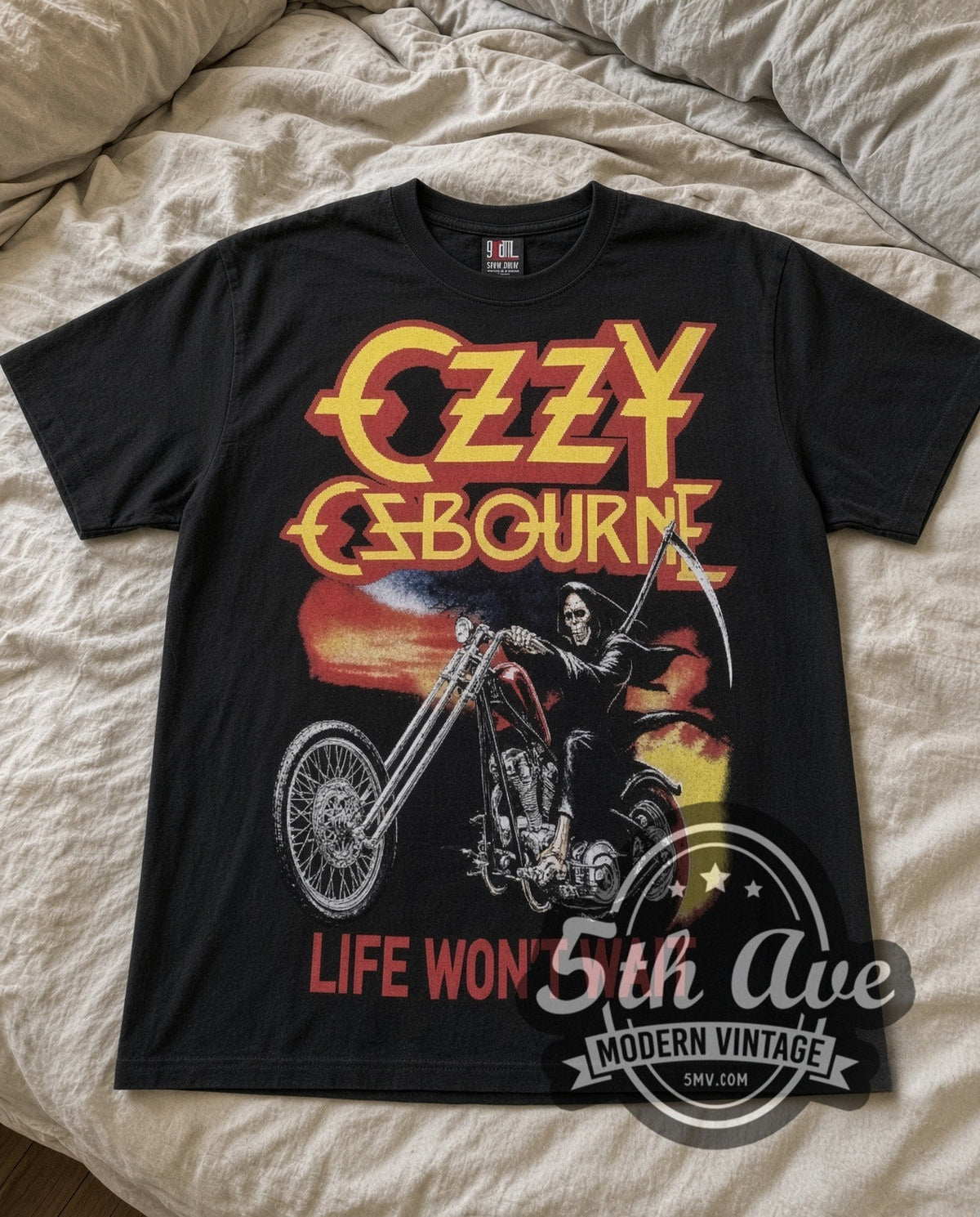 Ozzy Osbourne Life Won't Wait vintage band t-shirt in black laid flat on a bed, front artwork