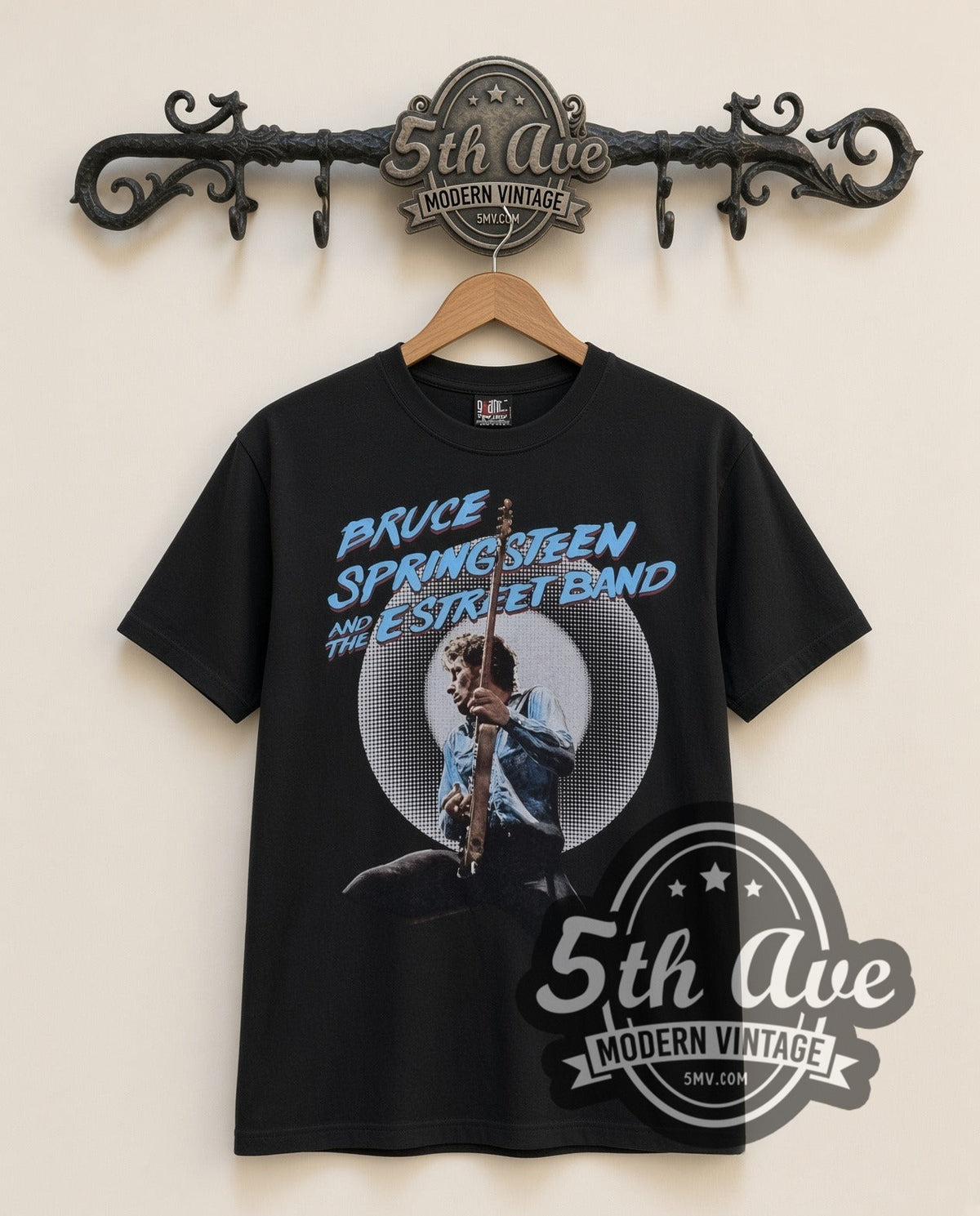 Bruce Springsteen E Street Band vintage band t-shirt in black, front view on a display rack