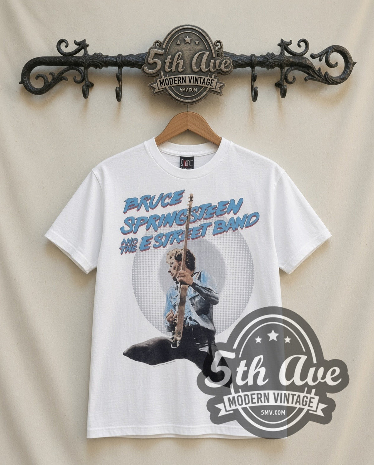Bruce Springsteen E Street Band vintage band t-shirt in white, front view on a display rack