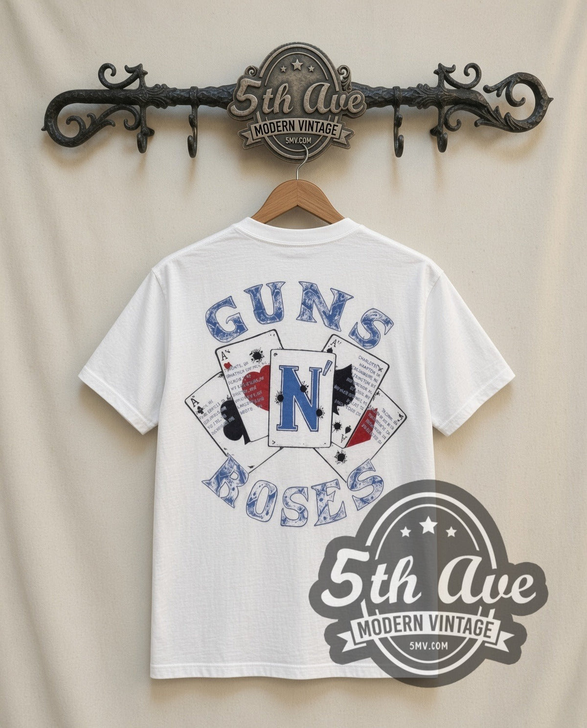 Guns N Roses Guns and Roses vintage band t-shirt in white, back view on a display rack