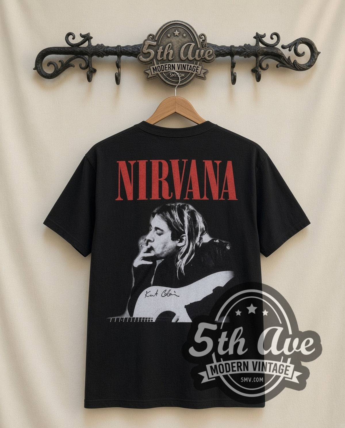 Kurt Cobain With Band vintage band t-shirt in black, back view on a display rack