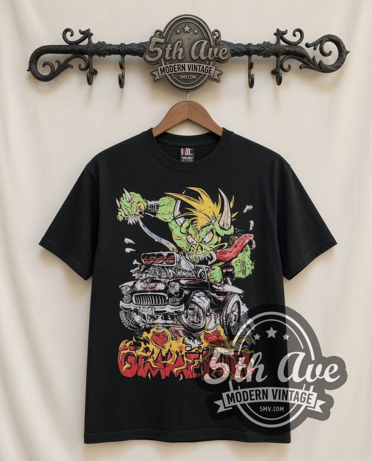 Gimme Fuel Hot Rod Monster vintage cartoon t-shirt in black, front view on a display rack
