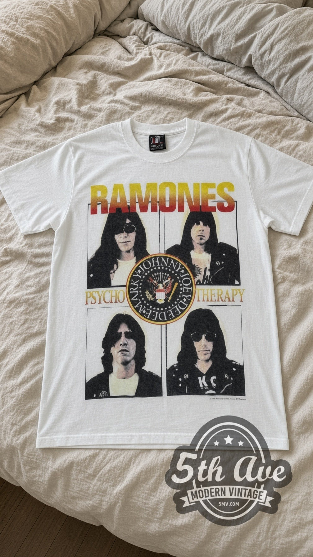 Ramones Psycho Therapy vintage band t-shirt in white laid flat on a bed, front artwork
