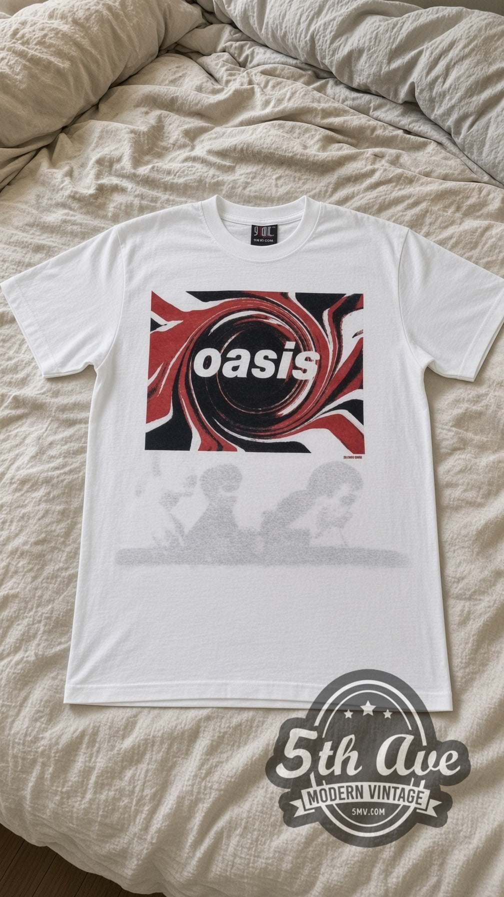 Oasis Swirl Logo vintage band t-shirt in white laid flat on a bed, front artwork