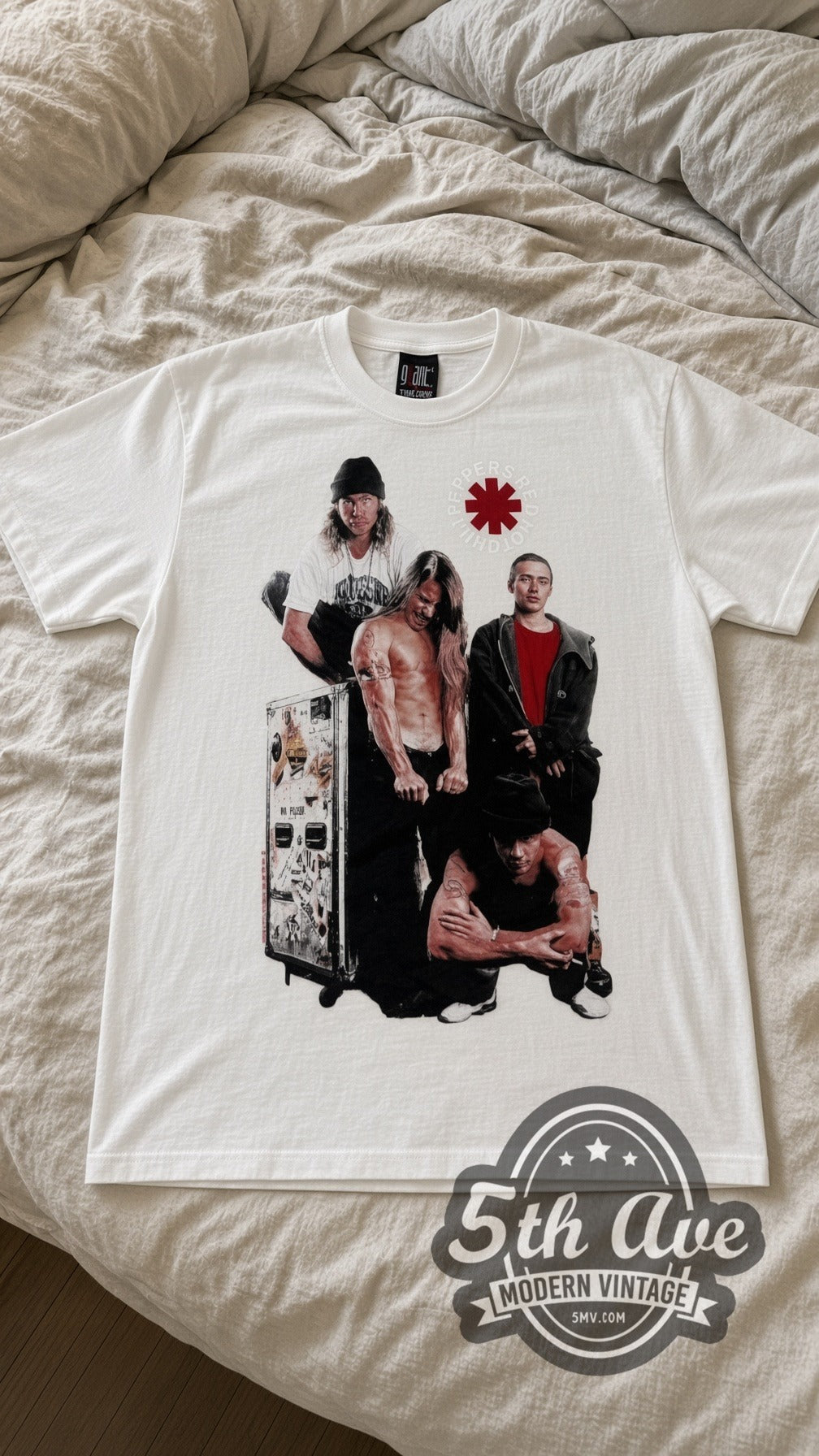 Red Hot Chili Peppers Asterisk Band vintage band t-shirt in white laid flat on a bed, front artwork