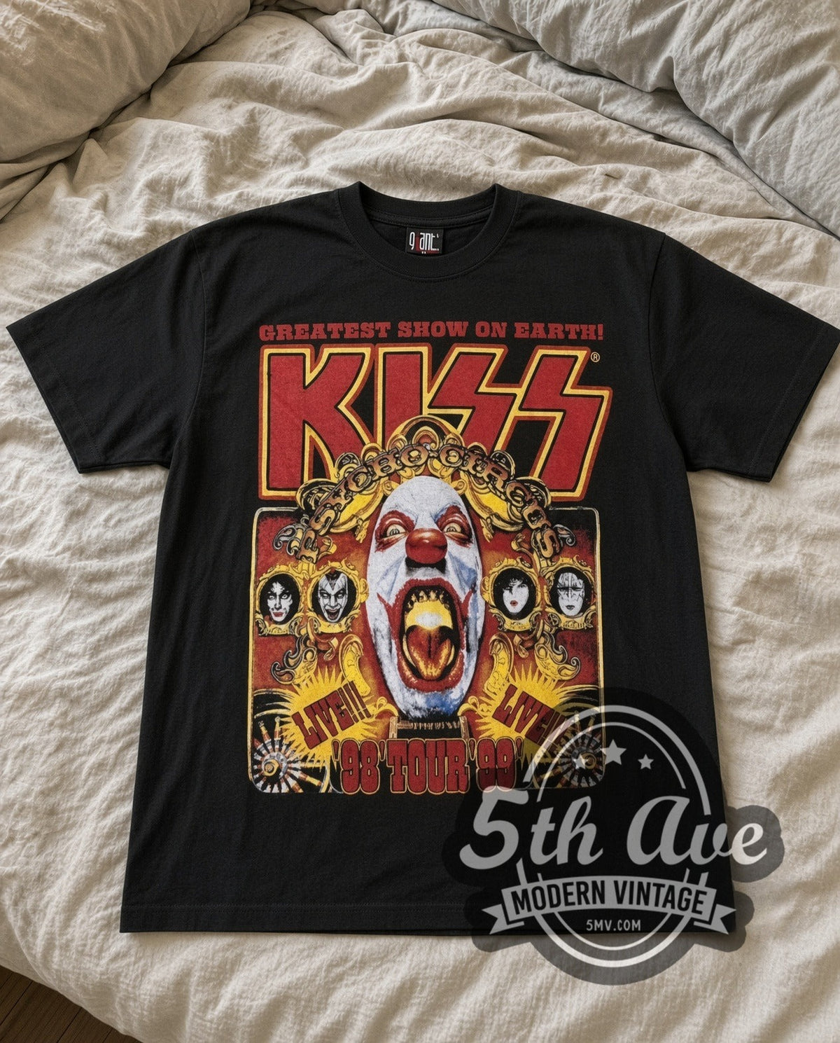 KISS Psycho Circus vintage band t-shirt in black laid flat on a bed, front artwork