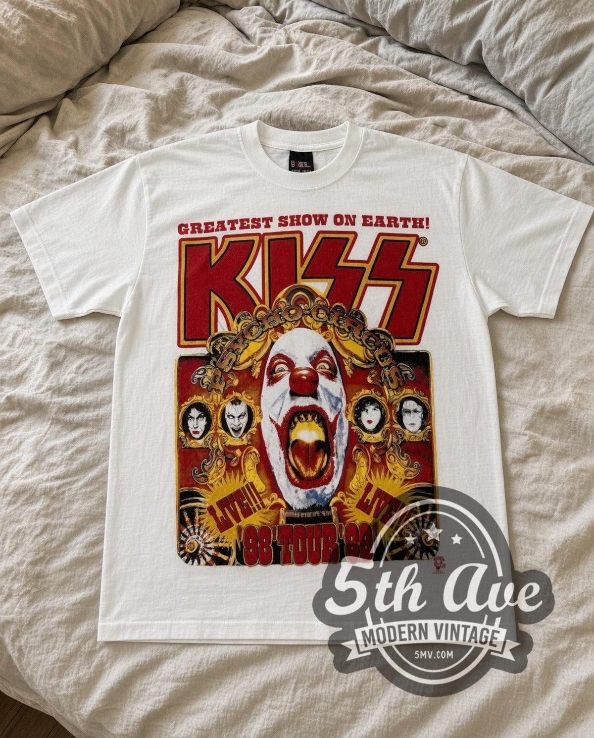 KISS Psycho Circus vintage band t-shirt in white laid flat on a bed, front artwork