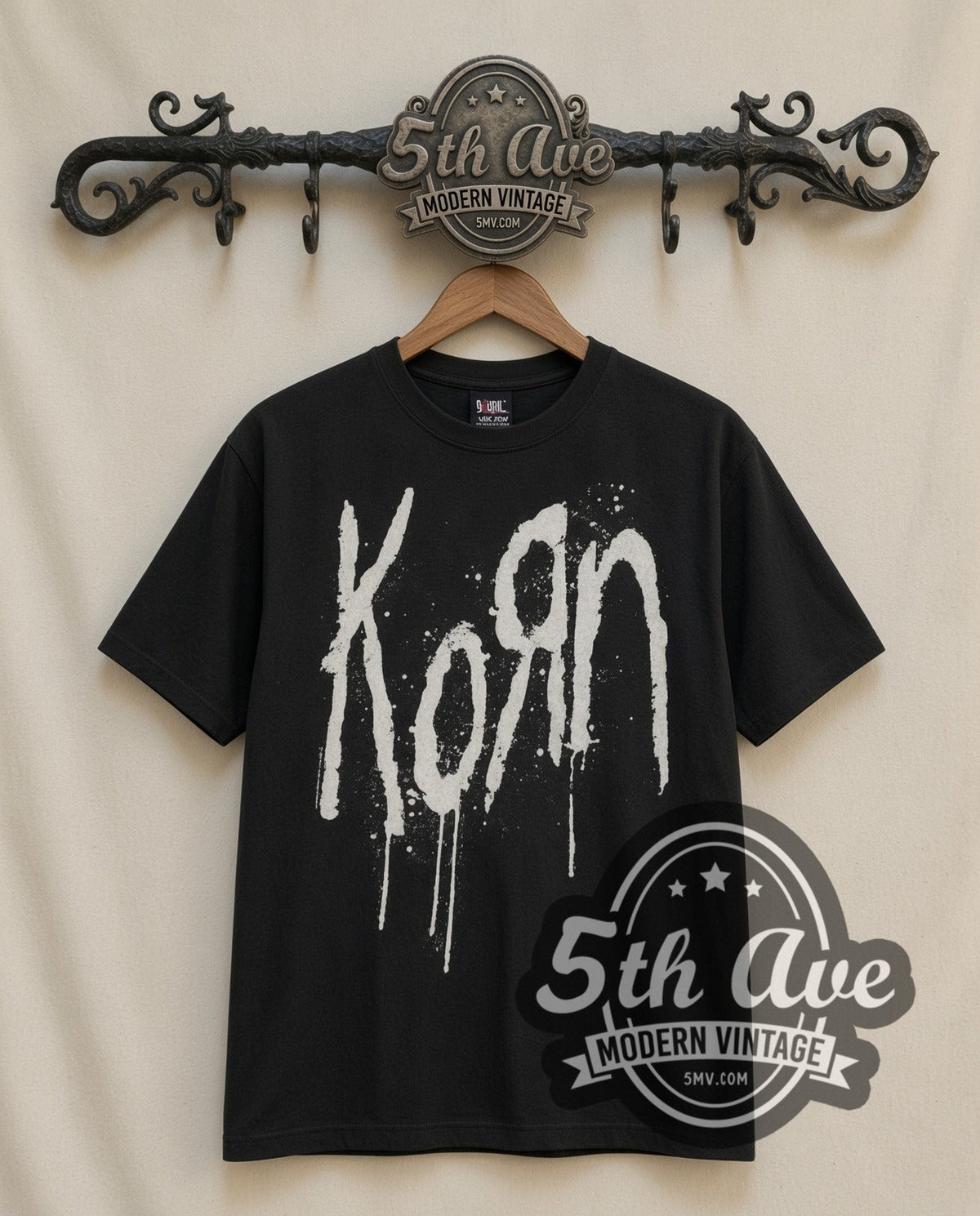 Korn Drip Logo vintage band t-shirt in black, front view on a display rack
