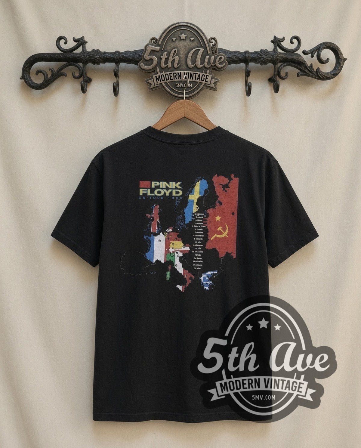 Pink Floyd Figure vintage band t-shirt in black, back view on a display rack