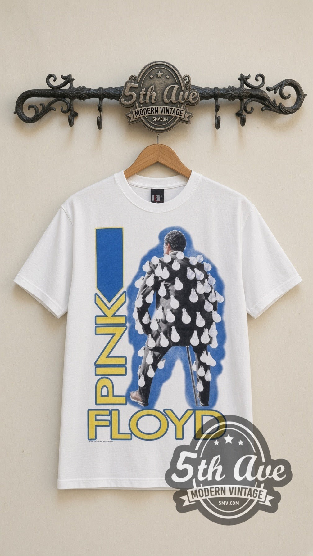 Pink Floyd Figure vintage band t-shirt in white, front view on a display rack