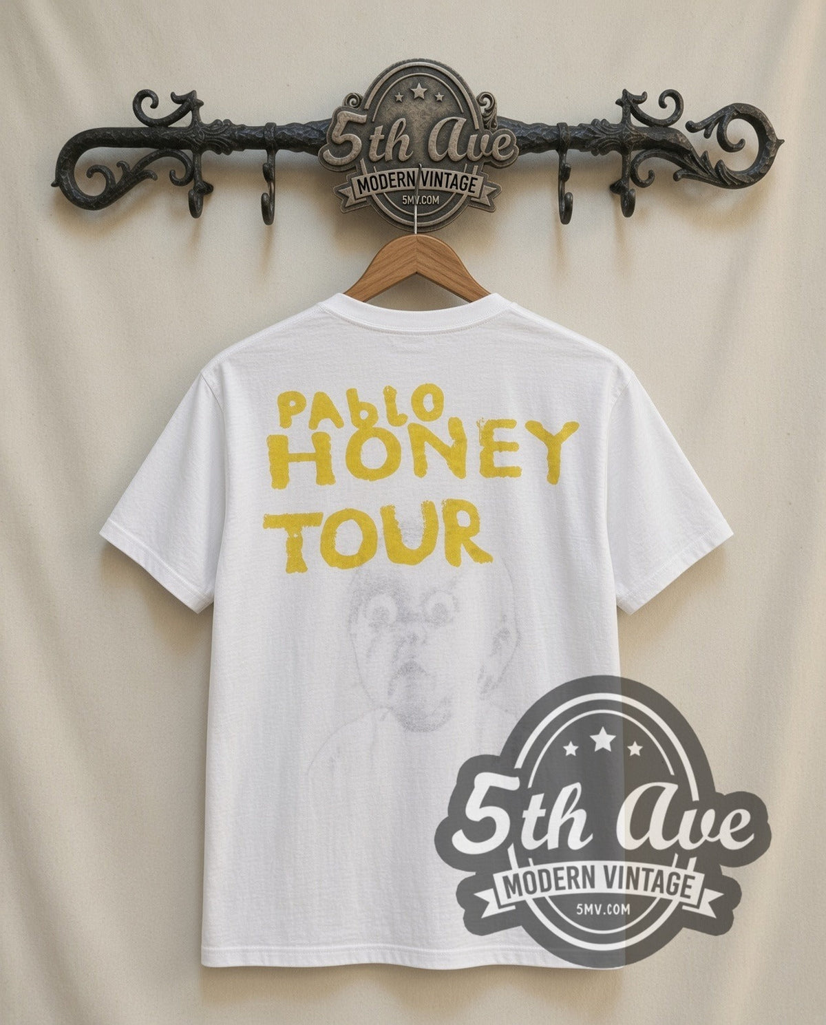 Radiohead Pablo Honey vintage band t-shirt in white, back view on a display rack